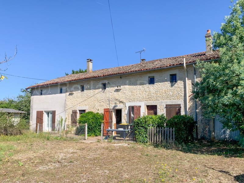 Pretty stone property to renovate with barns + garden