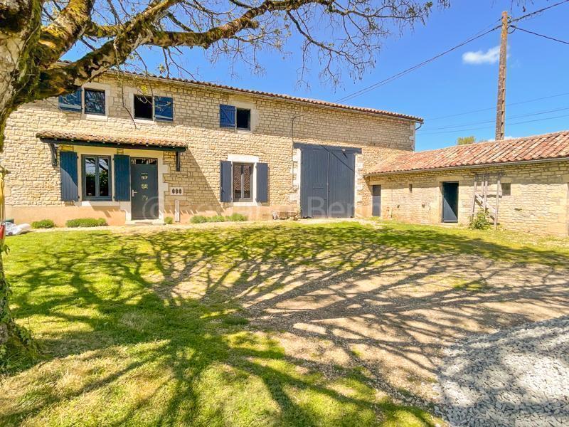 Stunning detached stone house with outbuildings + garden